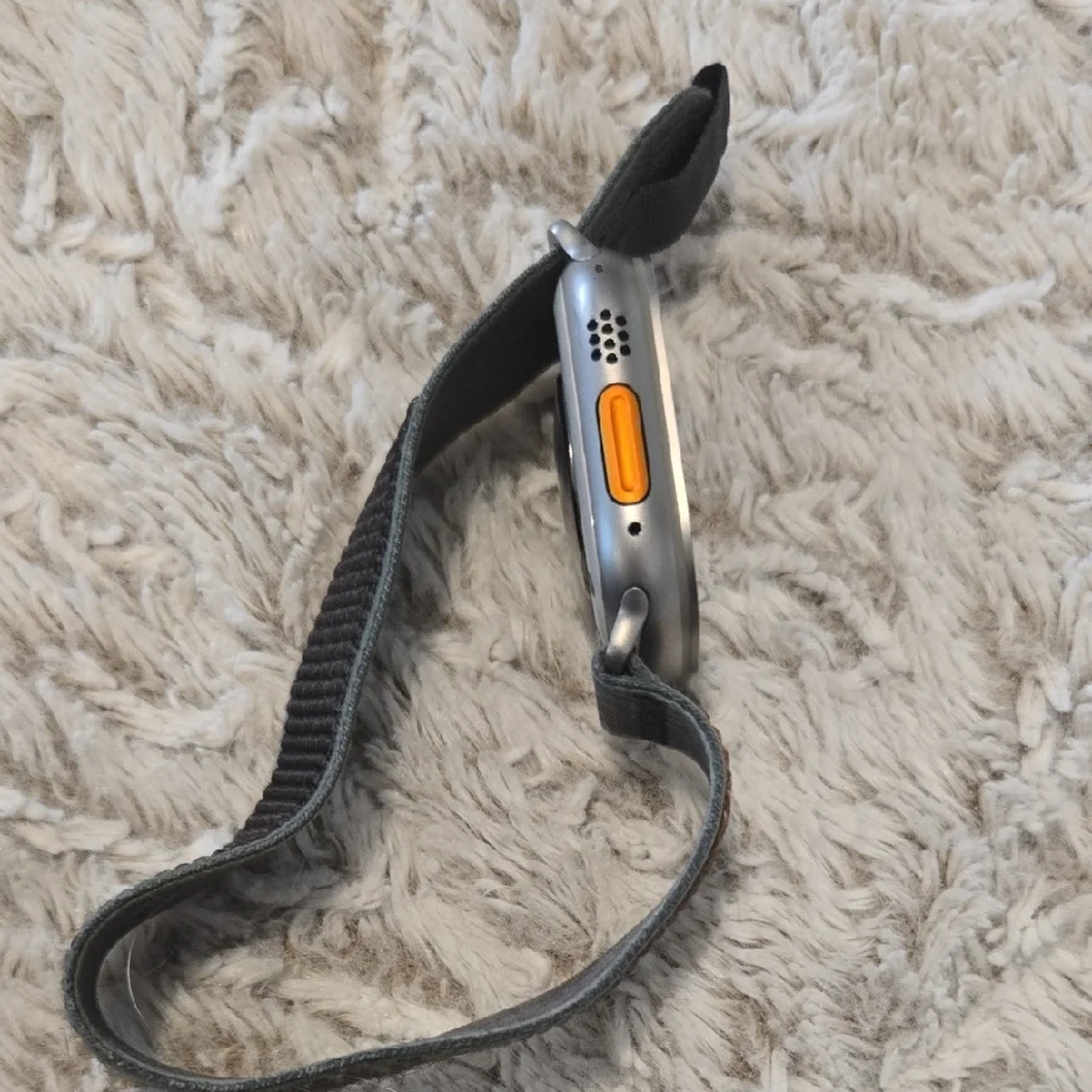 Advanced Smartwatch with Black Strap and Charger